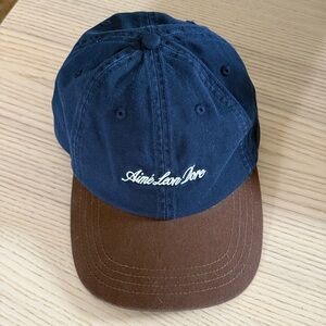 Aime Leon Dore Navy Cap with Brown Brim and White Script